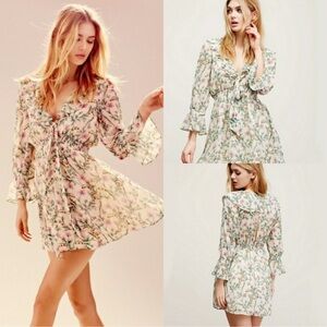 FREE PEOPLE Ditzy Floral Romantic Cream
Ruffle Swing Dress Size Small
